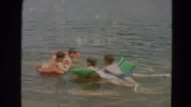 Minnesota US (1967): Kids Playing In The Water And Woman Comes To Check On Them