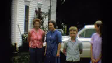 Minnesota USA (1967): Two Women And Two Older Children Post For Camera In Front Of