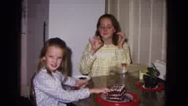 New Mexico USA (1967): Girls Try A Piece Of Birthday Cake At Their House With
