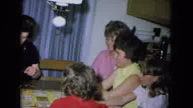 New Mexico USA (1967): Three Women And Two Female Children Sitting Around A Table