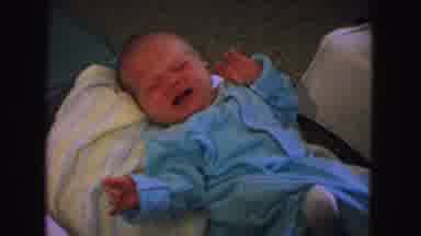 New Mexico USA (1967): A Baby In A Onesie Crying Moving Arms And Legs