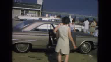 New Mexico USA (1967): Woman Gets Out Of A Car In Bikini By The Beach And Walks