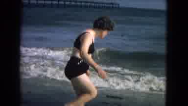 New Mexico USA (1967): There Is An Older Lady Walking Around The Beach In The