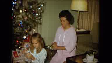 New Mexico USA (1967): Daughter And Mother Sitting Next To A Decorated Christmas