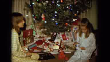New Mexico USA (1967): Little Girls Opening Gifts At Home On Christmas Around The