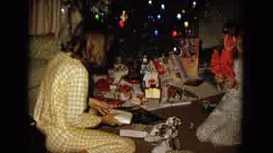 New Mexico USA (1967): Two Little Girls Open Christmas Presents In A Vintage Home