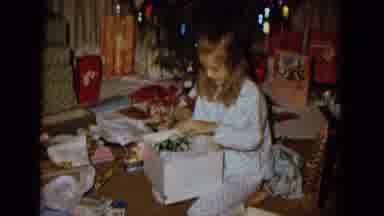 New Mexico USA (1967): White Blond-Haired Girl Opening Her Christmas Presents