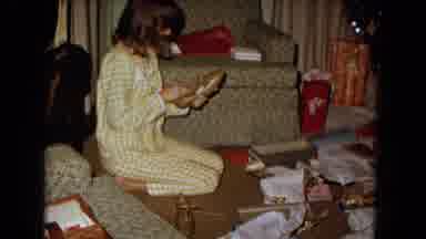 New Mexico USA (1967): Mother And Daughter Happily Unwrapping Christmas Gifts In