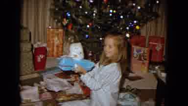 New Mexico USA (1967): Girl Receives Gift On Christmas Day Beside The Tree