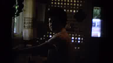 New Mexico USA (1967): Lady In Kitchen Turning Sink Off Young Girl With Crazy Hair
