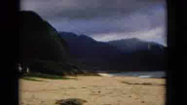 New Mexico USA (1967): A Scene Of A Beach And Mountains In The Background