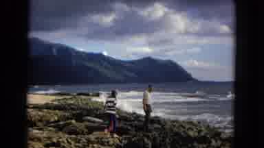 New Mexico USA (1967): Group Of 3 People On The Beach Who Are Watching The Waves