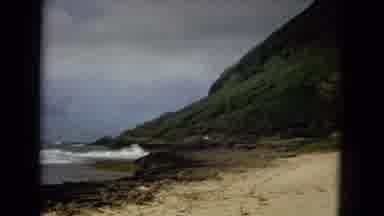 New Mexico USA (1967): Footage Of Child On Sandy Beach With Hilly Cliffs Located