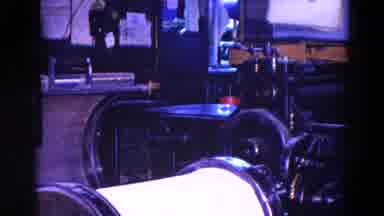 Trenton New Jersey (1967): A Workshop With Lots Of Equipment And A Man Wiping Down