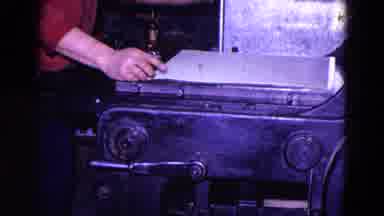 Trenton New Jersey (1967): Placing A Large Sheet Of Paper On Top Of A Machine