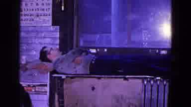 Trenton New Jersey (1967): Man With Glasses And Dirty Shirt Lays On Work Table