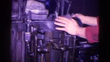 Trenton New Jersey (1967): Red Shirt Worker Operates Large Complex Machine That