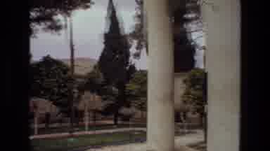 Iran (1972): A Courtyard Has Trees And Gravel Walkways And Is Flanked By Buildings