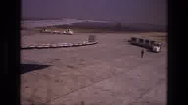 Iran (1972): Airport Carts Line Up And Look Like Small Trains As They Move The