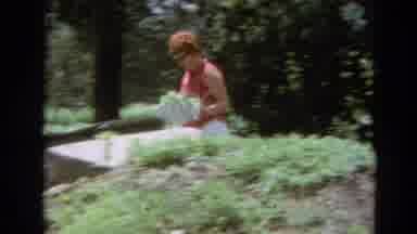 Branson Missouri USA (1968): A Lady In Capri Pants And Sunglasses Walks While