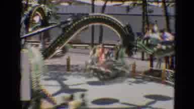 Branson Missouri USA (1968): Amusement Park Ride Spins Park Attendees Followed By