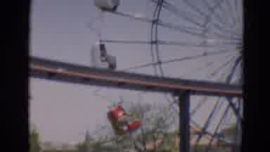 Branson Missouri USA (1968): A Ferris Wheel At A Carnival With Cars That Can