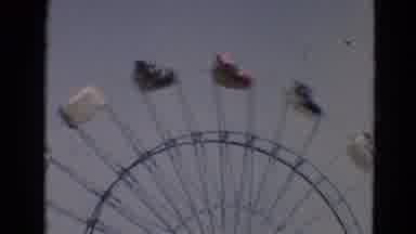Branson Missouri USA (1968): Amusement Park Ride Cars Swing Back And Forth On Big