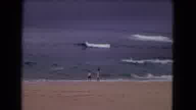 Honolulu Hawaii (1968): Children Playing On A Wavy Beach On A Cloudy Day