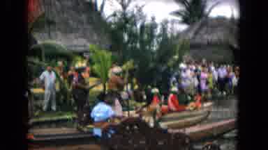 Honolulu Hawaii (1968): Musicians Performing In Brown Canoes For Crowds On A Clear