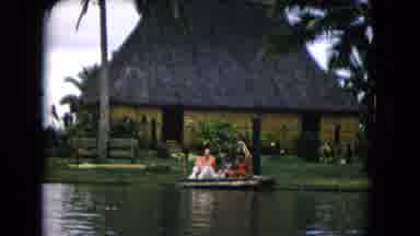 Honolulu Hawaii (1968): Men Dressed In Tribal And Cultural Wear Ride A Handmade