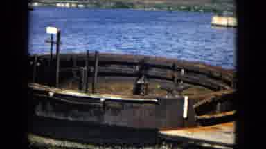 Honolulu Hawaii (1968): A Rusty Boat In The Ocean With Heavy Water And Rust During