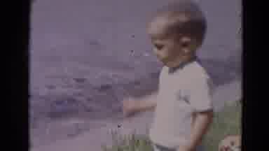 Lincoln Nebraska (1968): A Toddler Boy Riding A Bike Outside