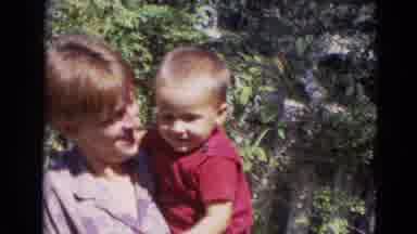 Lincoln Nebraska (1968): Mother Playing With Her Son In Hand