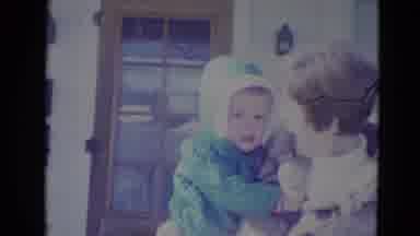 Lincoln Nebraska (1968): Mother With Two Boys Waving Outside In The Cold