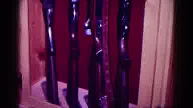Minnesota USA (1968): Four Guns Shows With A Red Wall Background That Has An