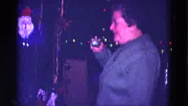 Minnesota USA (1968): Old Lady Drinking And Enjoying Christmas