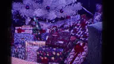 Minnesota USA (1968): Children Getting Ready To Open Presents Under The Christmas