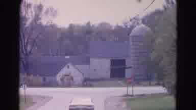 Wauconda Illinois USA (1968): Vintage Film Footage Of A Car Driving On A Road