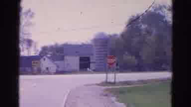 Wauconda Illinois USA (1968): Old Flickering Video Showing Car Turning Near Stop