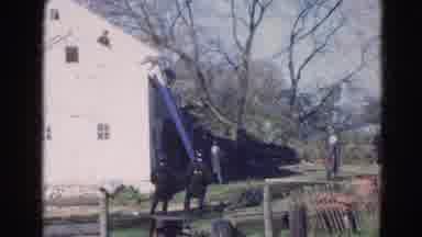 Wauconda Illinois USA (1968): Man Descends Ladder From Roof Of White House With