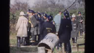 Wauconda Illinois USA (1968): Firemen Or Police Officers Looking At A Suspected
