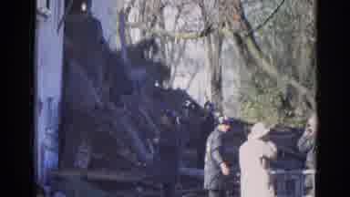 Wauconda Illinois USA (1968): A Collapsed House Where Firefighters Are Working On