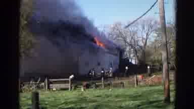 Wauconda Illinois USA (1968): Building On Fire With Thick Black Smoke Billowing