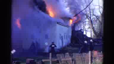 Wauconda Illinois USA (1968): Brave Firefighters Working Hard Extinguishing
