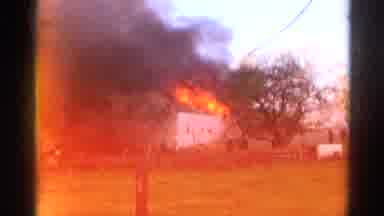 Wauconda Illinois USA (1968): Fire Fighters Using A Massive Hose Trying To Put Our