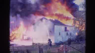 Wauconda Illinois USA (1968): A House On Fire Showing Flames Blazing From The