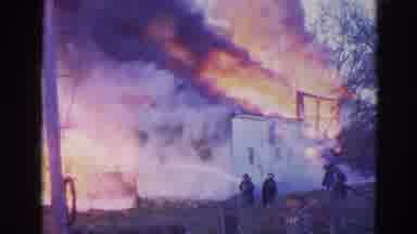Wauconda Illinois USA (1968): Firemen Attempting To Put Out A White House Engulfed