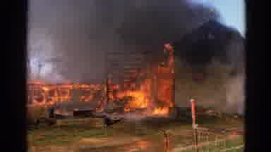Wauconda Illinois USA (1968): Brave Firefighters Extinguishing The Farm House That