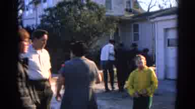 Wauconda Illinois USA (1968): People Standing Outside Nervously Looking At A