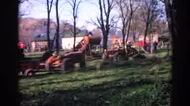 Wauconda Illinois USA (1968): A Factory In A Forest With Workers Moving Around And